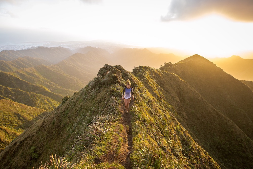 Woman hiking downhill